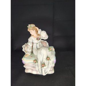 Lefton Music Box young woman sitting on sofa